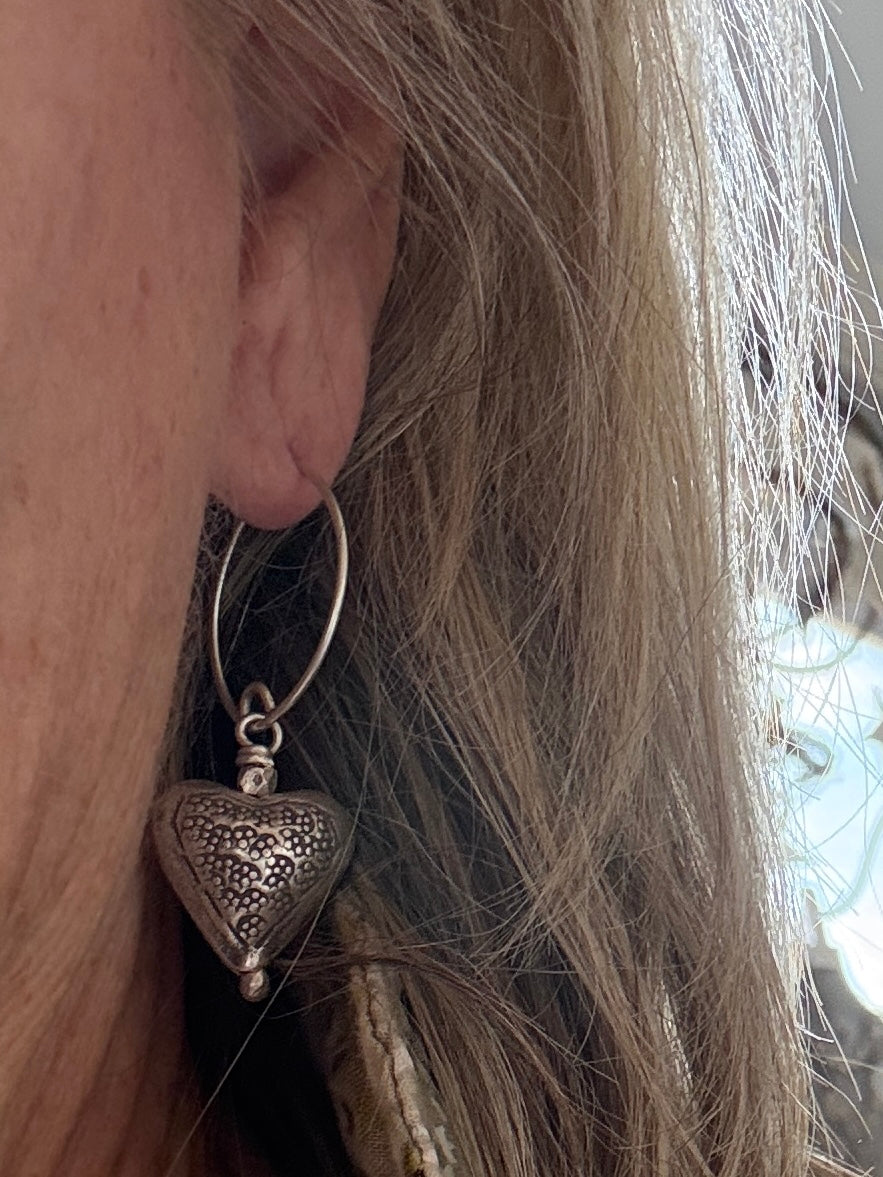 Stamped fine silver heart earrings.