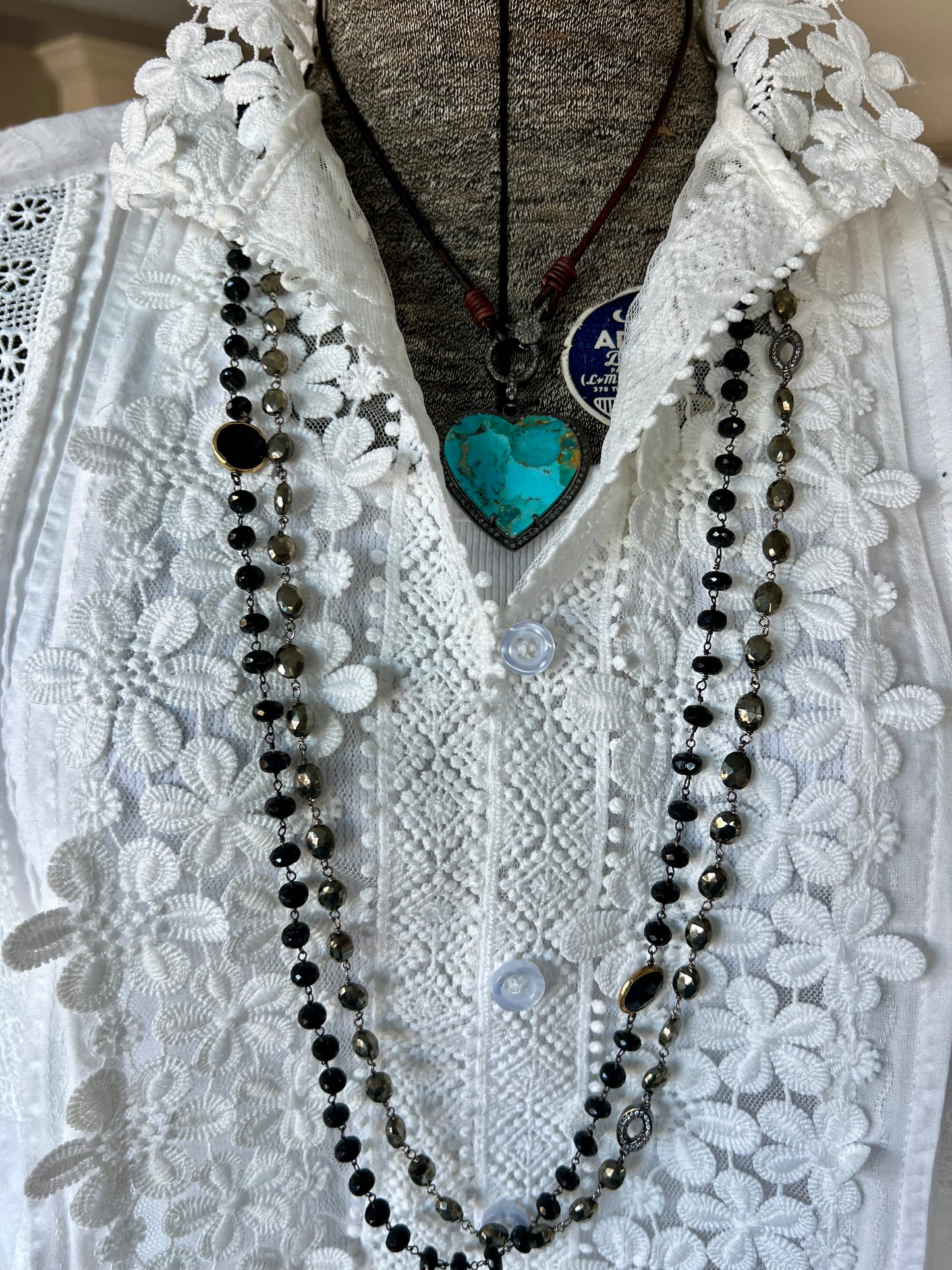 Pavé diamond turquoise heart on leather with diamond clasp/charm holder. 18”. Boho luxe necklace.