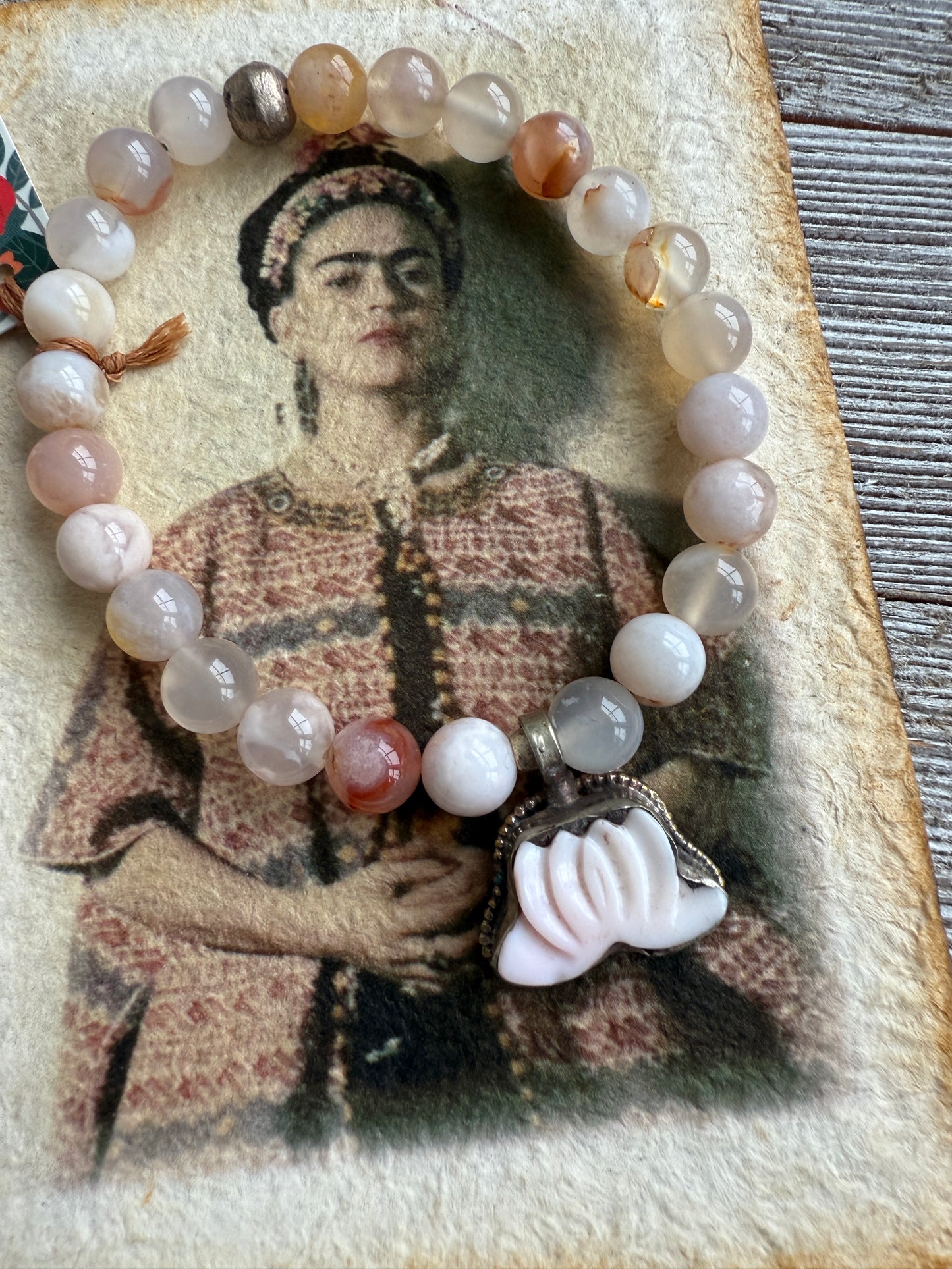 Carved tibetan Peruvian Opal lotus flower on cherry blossom agates stretch bracelet. 7-7.5”