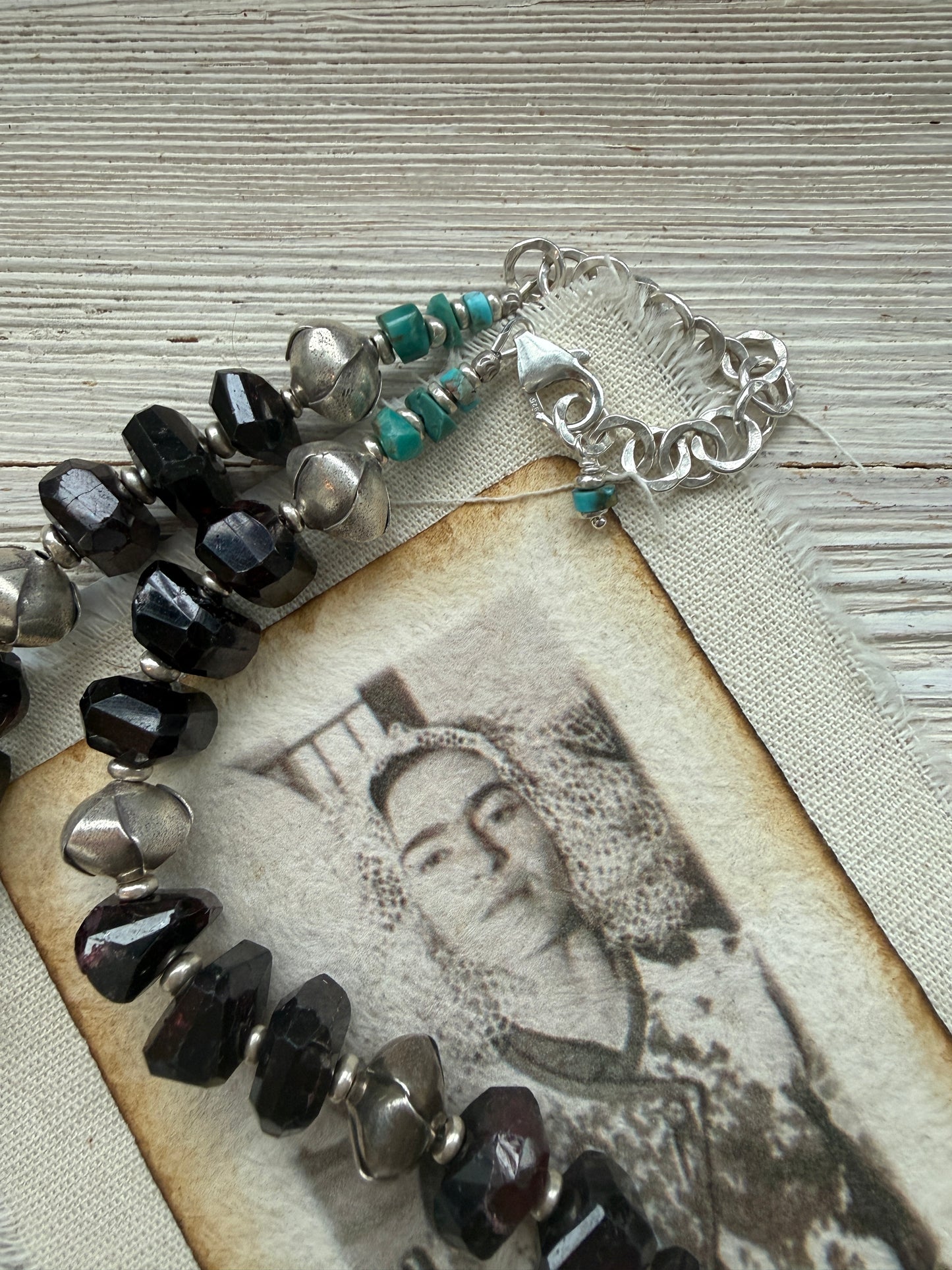 Faceted garnets with fine silver origami beads and turquoise necklace.