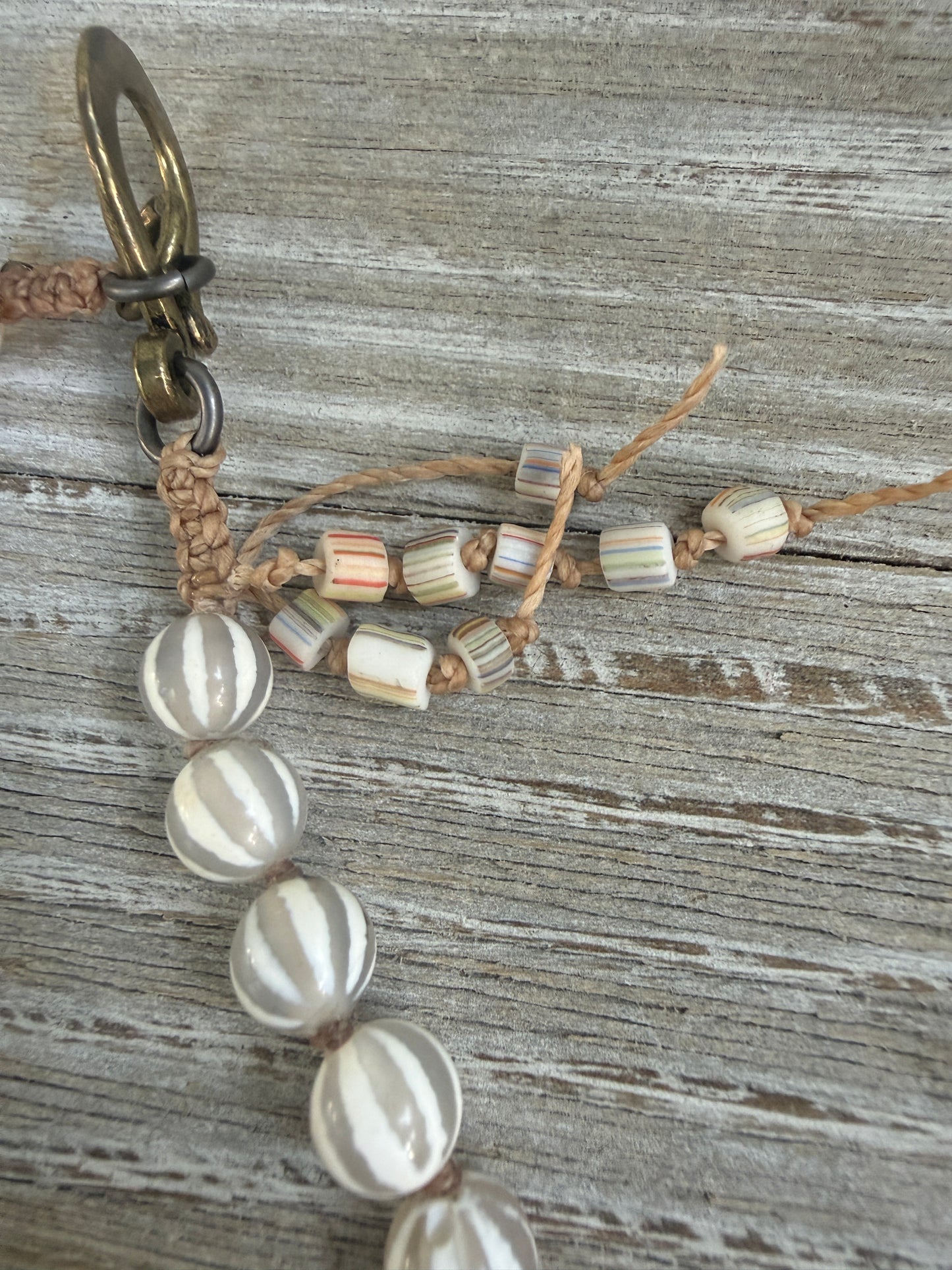 Knotted white striped agate Dzi beads long necklace with removable carved bone Tibetan flaming heart pendant. 35”