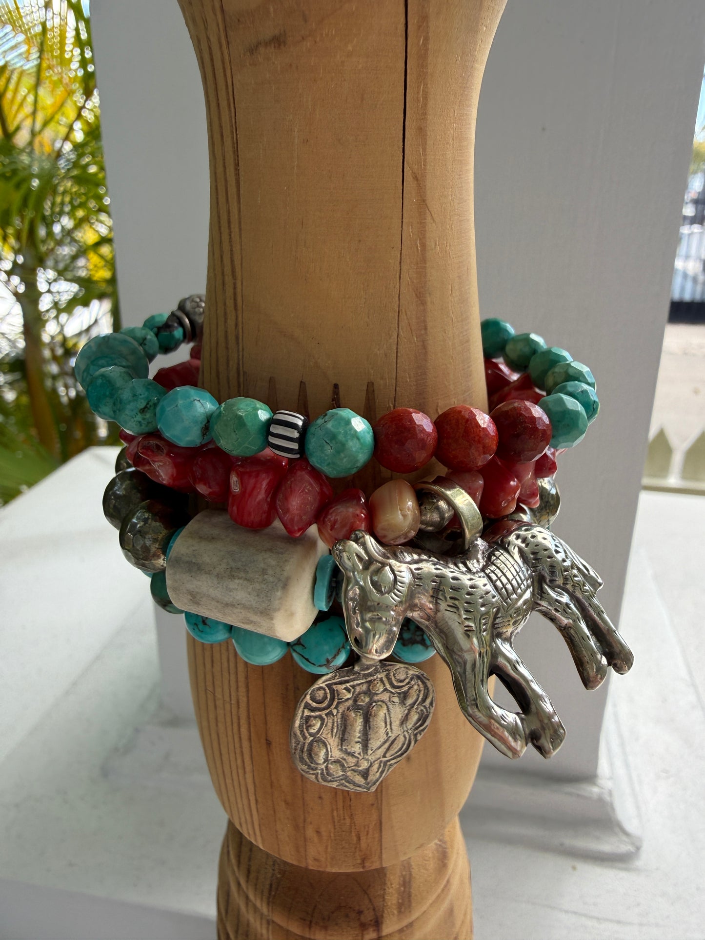 Simplicity in turquoise, fine silver, and broom coral with one trade bead. Stretch bracelet. 6.5”