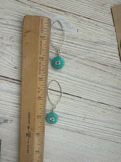 Turquoise with blue topaz inlay on sterling earrings.