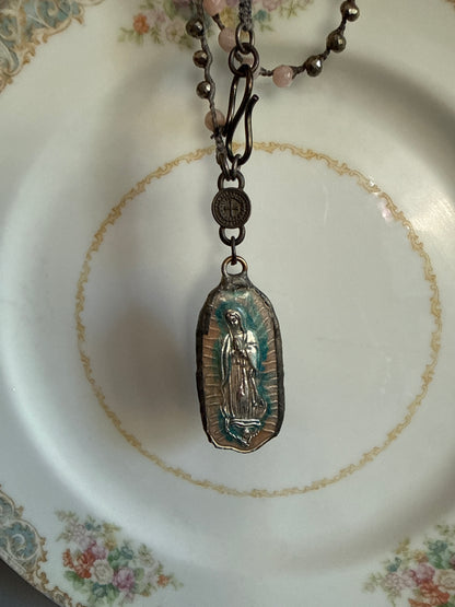 Our Lady of Guadeloupe pendant on knotted sunstone necklace.