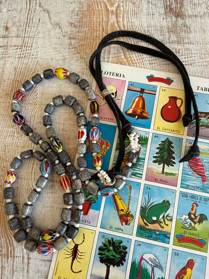 Midnight bone beads with African chevron beads extra long adjustable necklace on leather. 58”