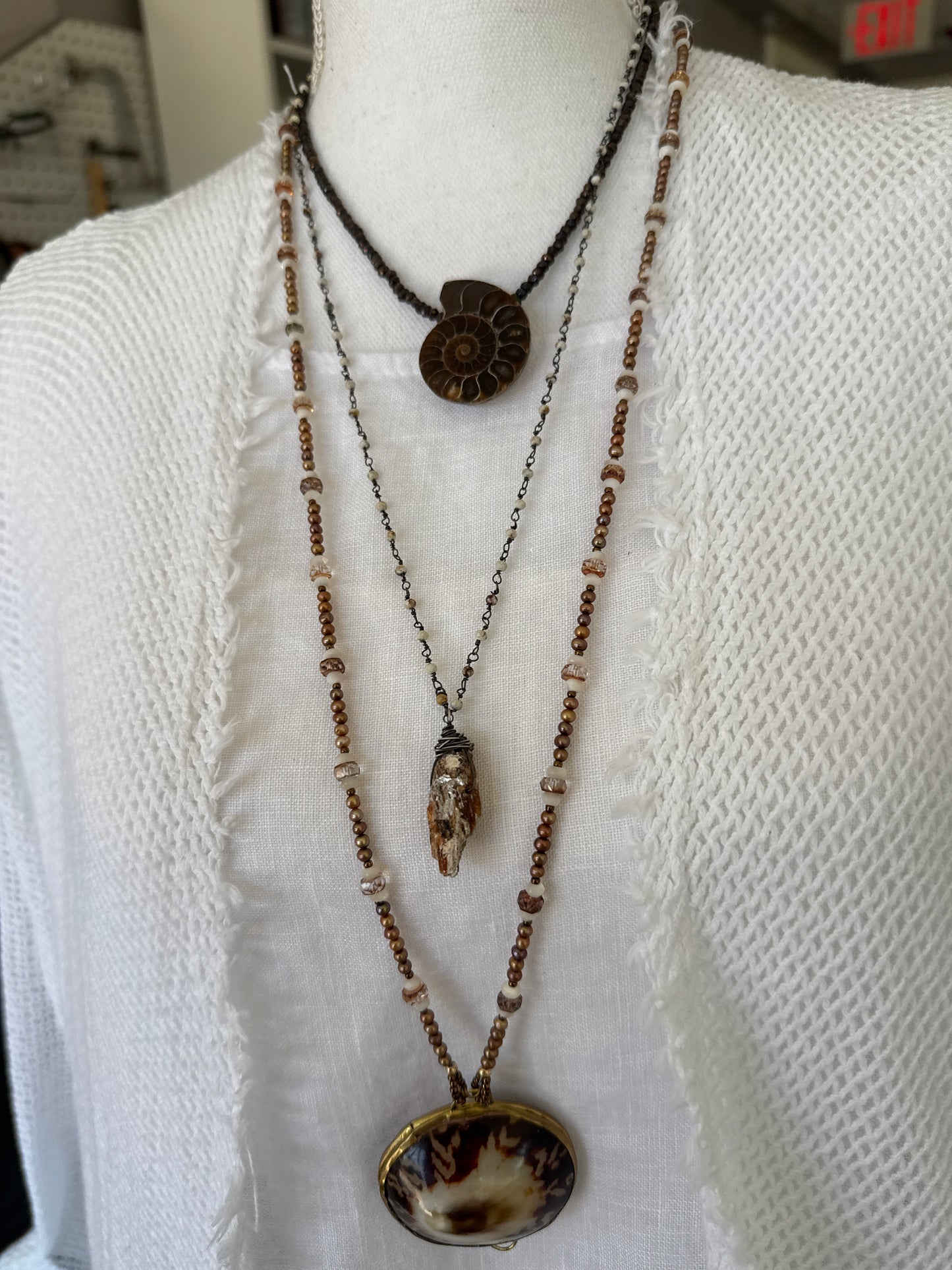 Ammonite fossil on chocolate pyrite necklace. 17.5-19”