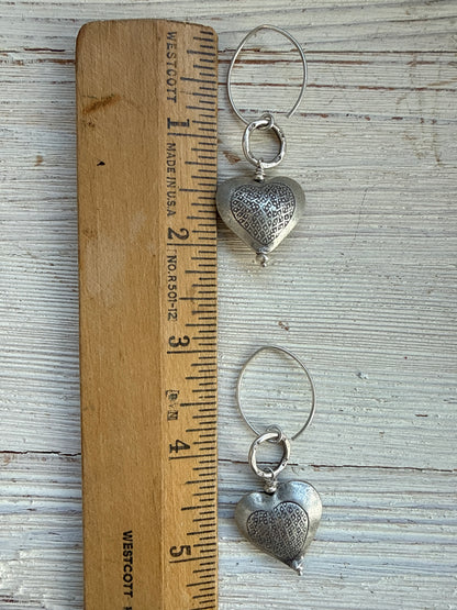 Textured fine silver heart earrings.