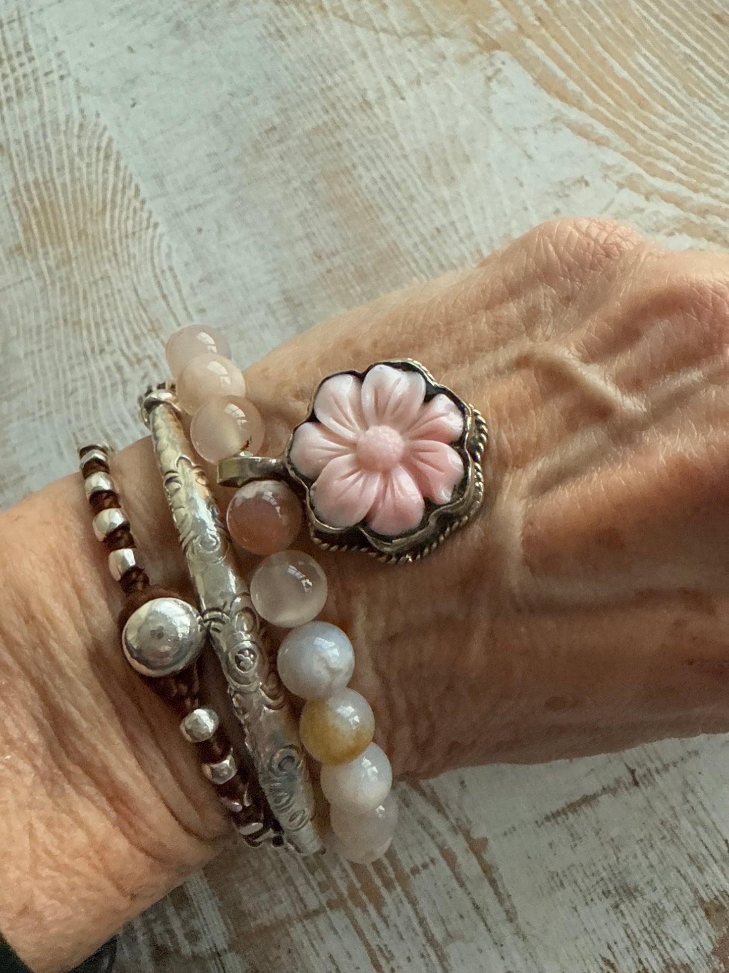 Cherry blossom agate beads with pink Peruvian Opal flower charm stack bracelet from Tibet. 7”