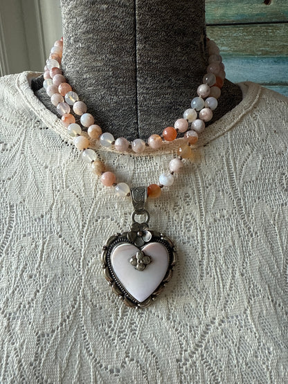 Cherry blossom agates hand knotted necklace with Peruvian Opal Tibetan heart pendant. 32.5-35.5”.