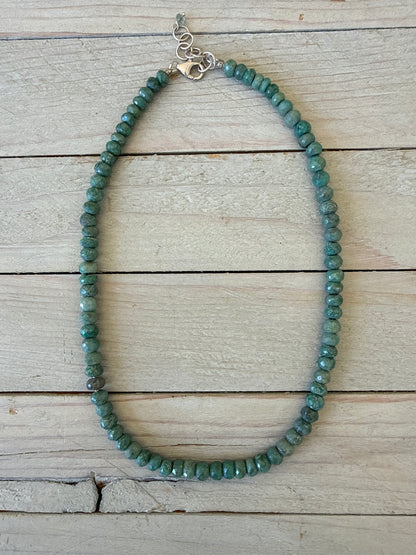 Faceted chrysocolla with one labradorite bead necklace. Sterling silver clasp and extender chain. 17.5-19”