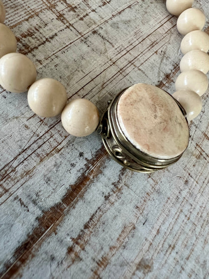 Tibetan bone focal bead with fossil jasper riverstone beads stretch stacker bracelet. 7”.