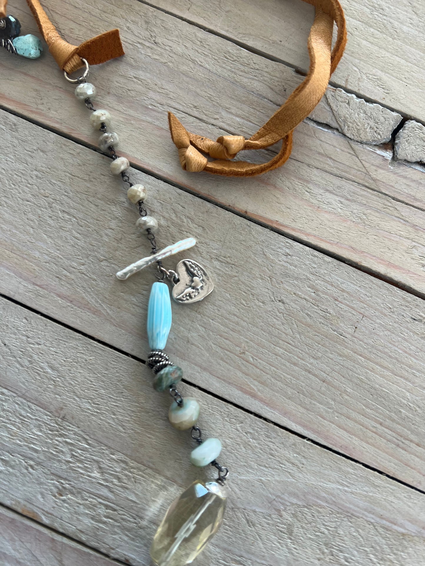 Turquoise teardrop on assorted gemstones adjustable boho luxe necklace.