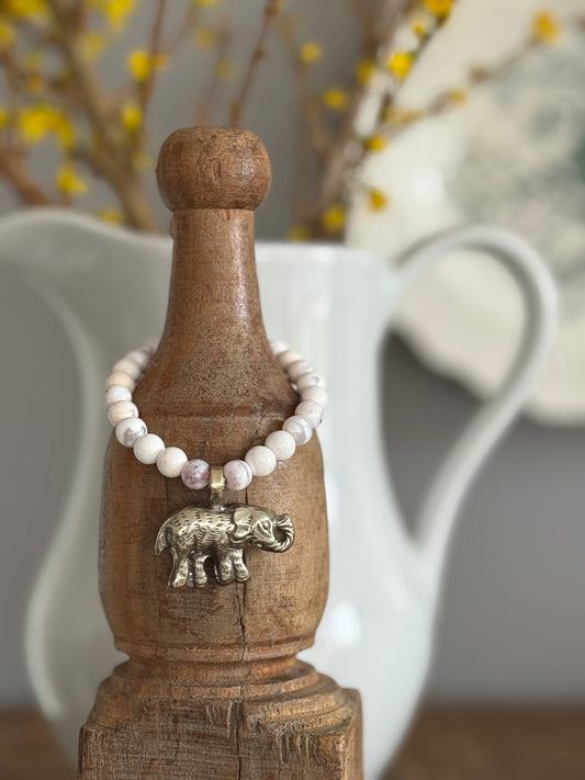 Tibetan bronze elephant on peach blossom agates stretch stack bracelet. 6.5”