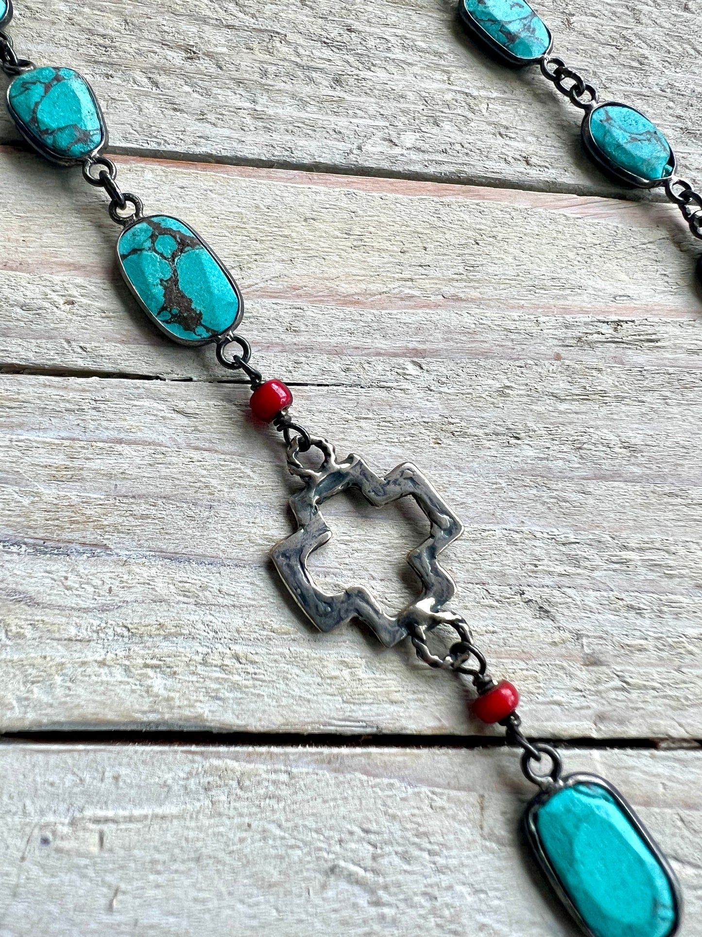 Gorgeous turquoise chain with hand made sterling open cross and toggle. 29”.