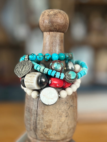 Old Tibetan turquoise focal with turquoise heishi beads. Adjustable bracelet 7-8.25”.