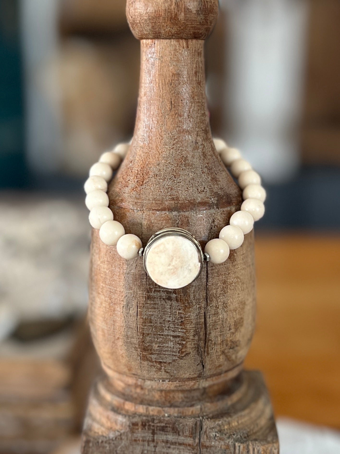 Tibetan bone focal bead with fossil jasper riverstone beads stretch stacker bracelet. 7”.