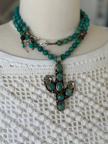 Turquoise cactus pendant necklace on knotted turquoise with smoky quartz and fine silver accents.