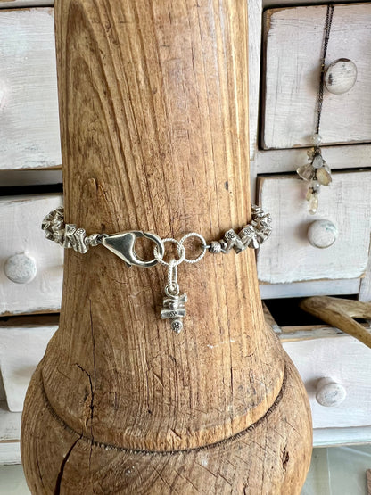 Stamped fine silver twigs bracelet with sterling clasp. 7.25-7.75”