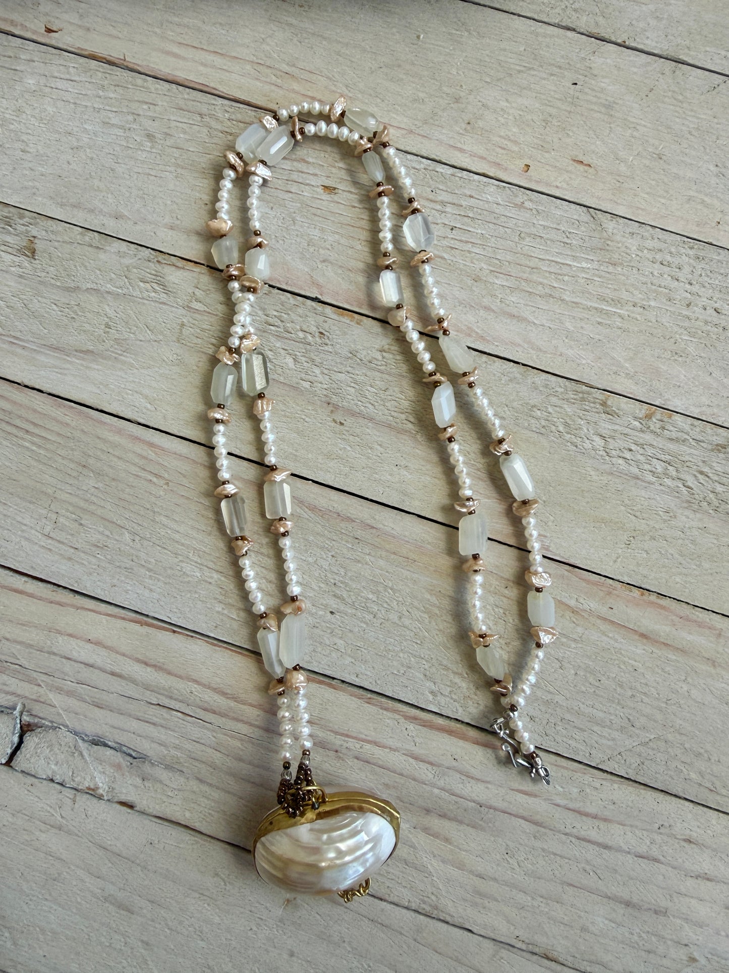 White shell pendant with moonstone and natural pearl necklace.