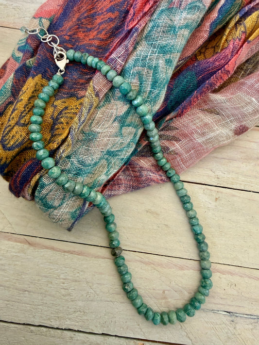 Faceted chrysocolla with one labradorite bead necklace. Sterling silver clasp and extender chain. 17.5-19”