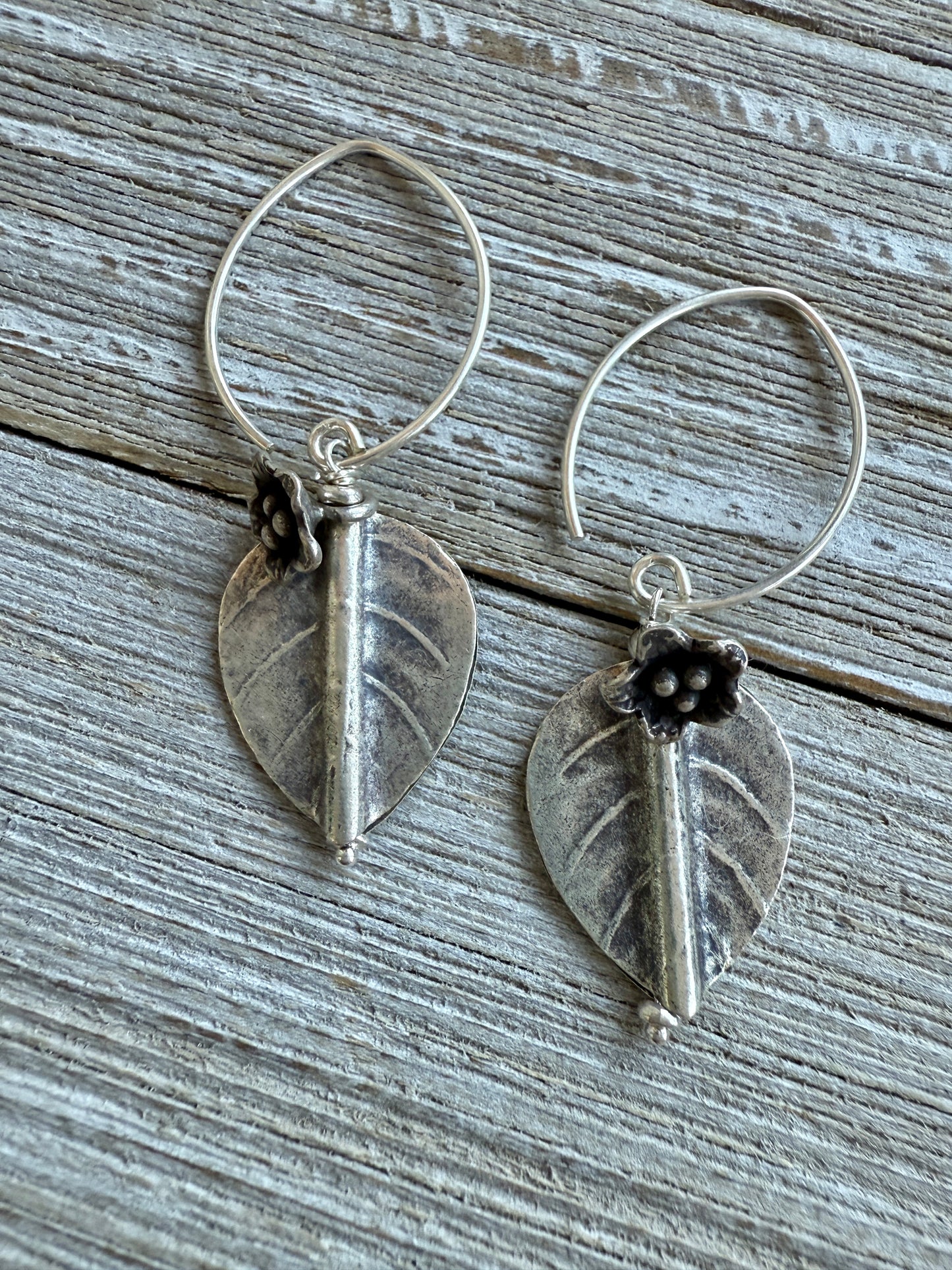 Fine silver leaf and flower earring on fine silver earwires.