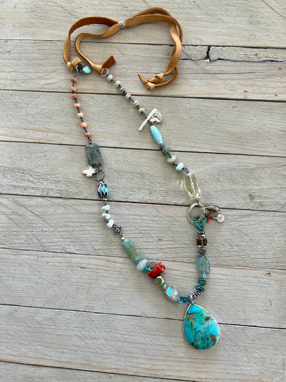 Turquoise teardrop on assorted gemstones adjustable boho luxe necklace.