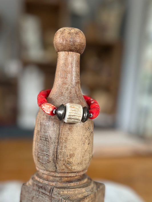 Antler with coral stretch stack bracelet.