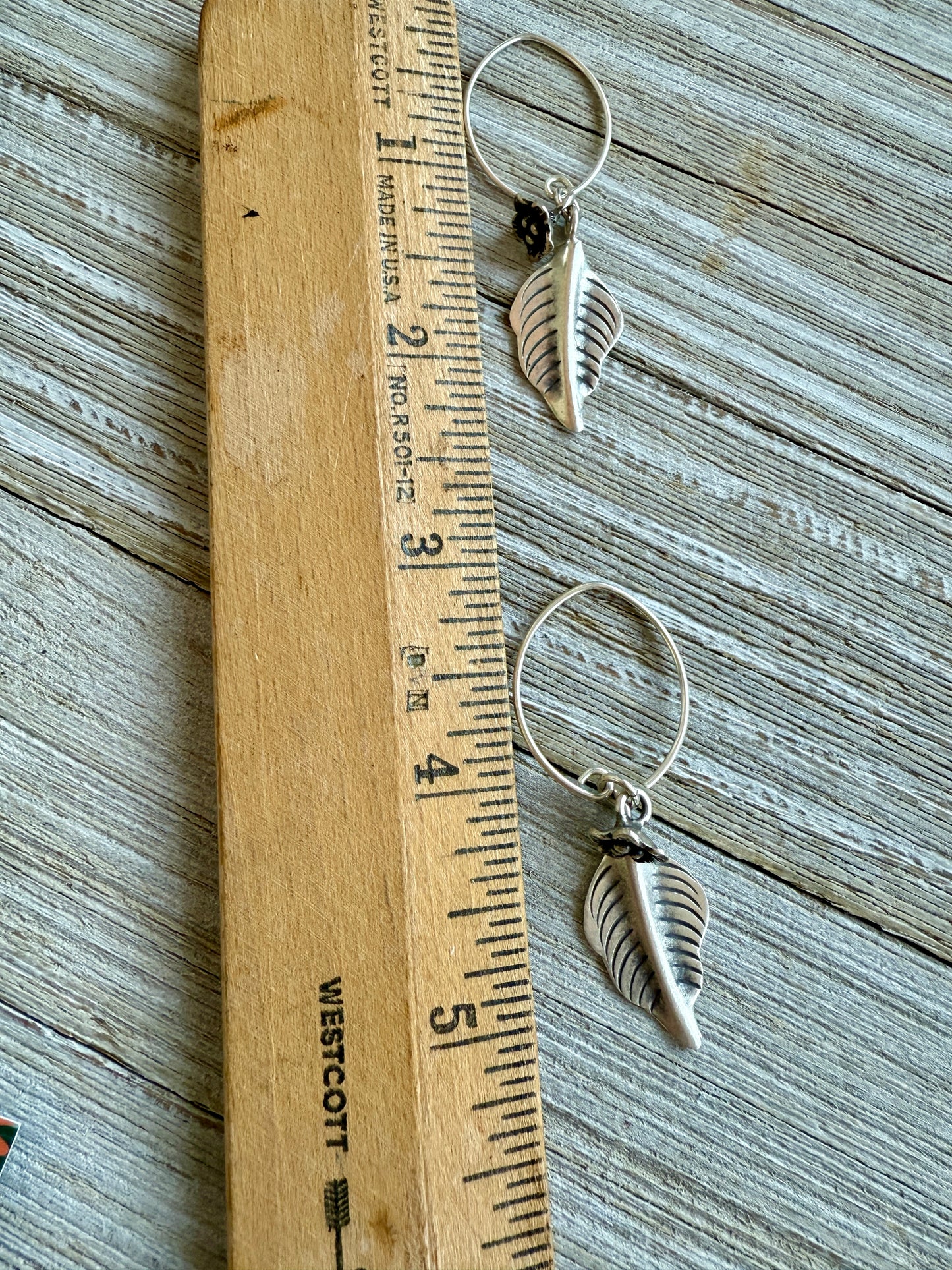 Handmade fine silver leaves and flowers earrings with fine silver ear wires.