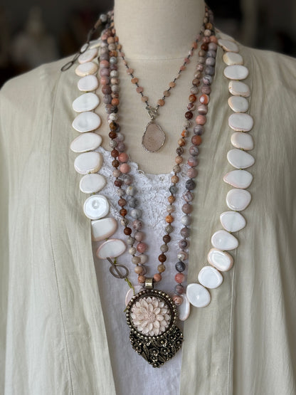 Pale pink druzie on pink Peruvian Opal wire-wrapped coins. Front fine silver toggle necklace.