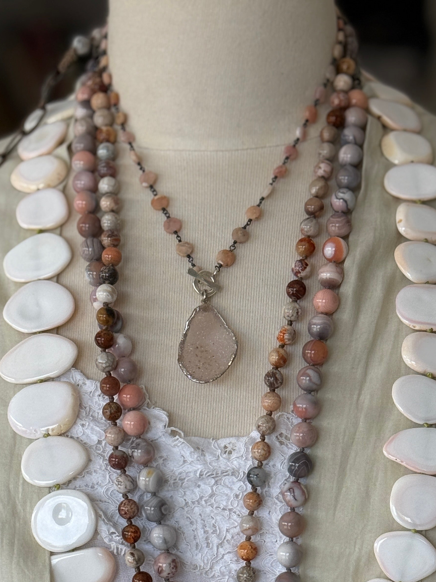 Pale pink druzie on pink Peruvian Opal wire-wrapped coins. Front fine silver toggle necklace.
