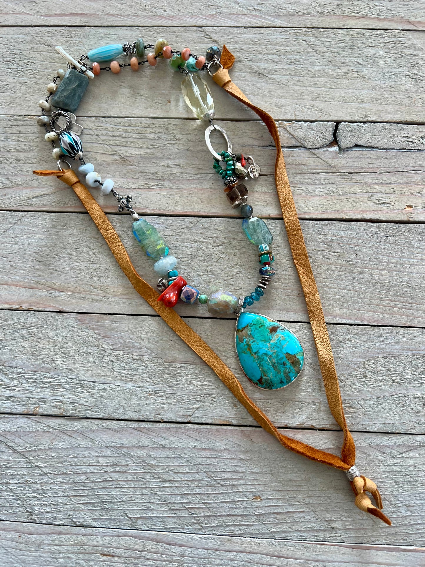 Turquoise teardrop on assorted gemstones adjustable boho luxe necklace.