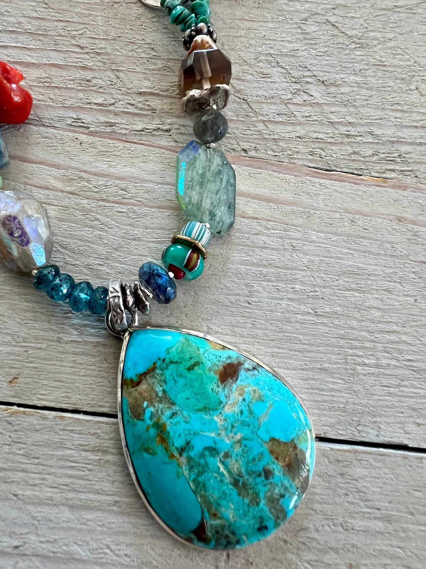 Turquoise teardrop on assorted gemstones adjustable boho luxe necklace.