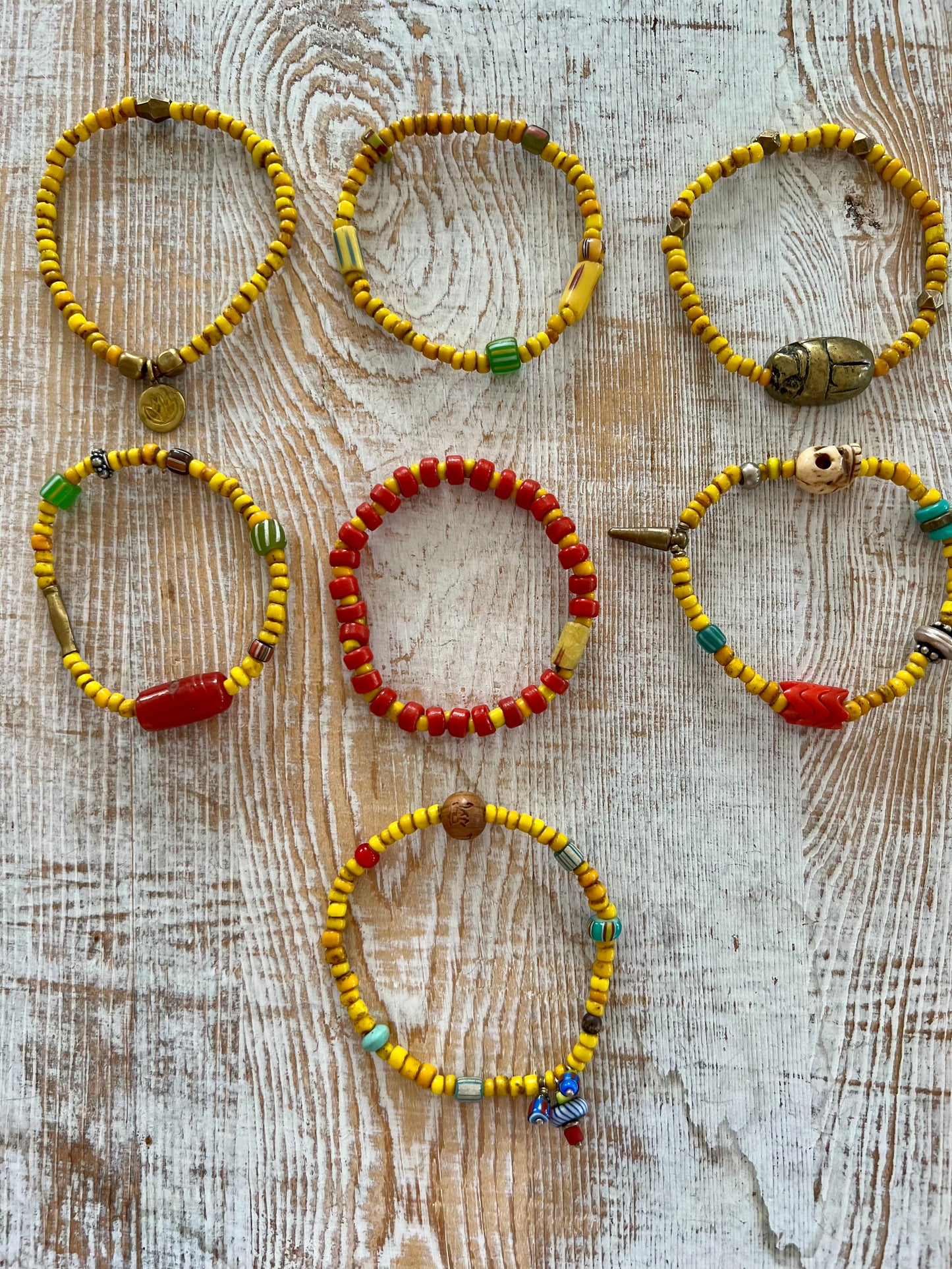 Maize glass bead stack of 7 bracelets.