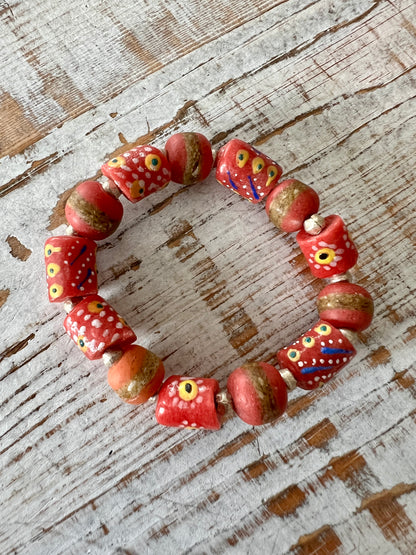 Coral krobo glass stretch stack bracelet. 7”