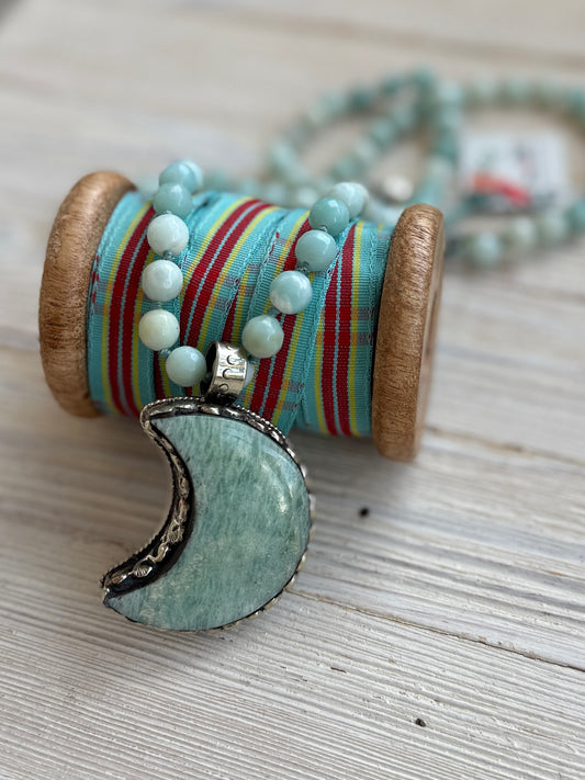 Tibetan amazonite crescent moon on knotted amazonite beads. 34”