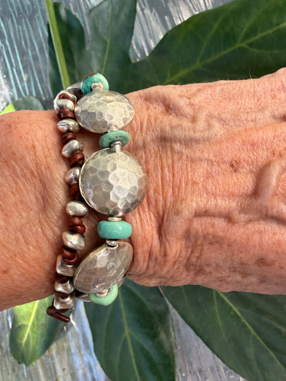 Hammered fine silver pillow coins with turquoise stretch bracelet. 6.5”