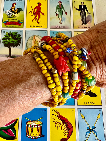 Maize glass bead stack of 7 bracelets.