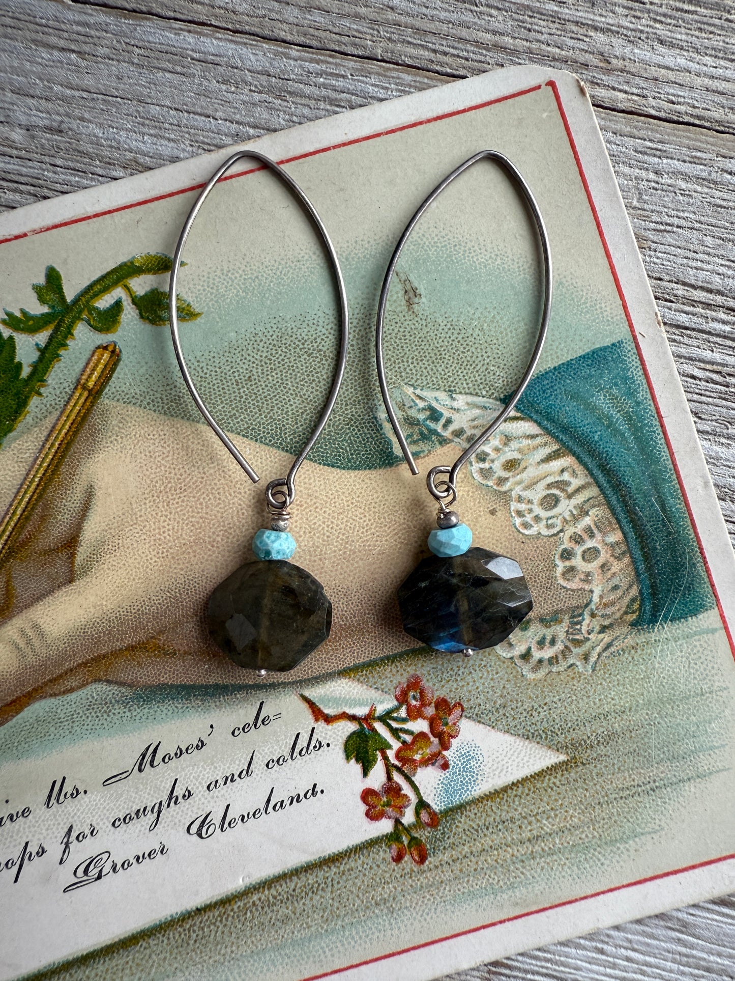 Faceted labradorite and turquoise dangle earrings on sterling ear wires.