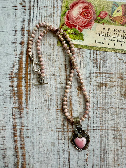 Tibetan pink Peruvian Opal heart on faceted pink opals. 18-19.5” necklace.