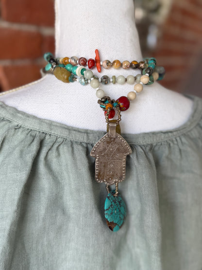 57” of turquoise Amazonite, Jasper, larimar, jade, riverstone, trade beads, Ethiopian silver, broom coral, and others lariat necklace with sterling hamsa and turquoise necklace.