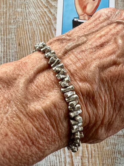 Stamped fine silver twigs bracelet with sterling clasp. 7.25-7.75”