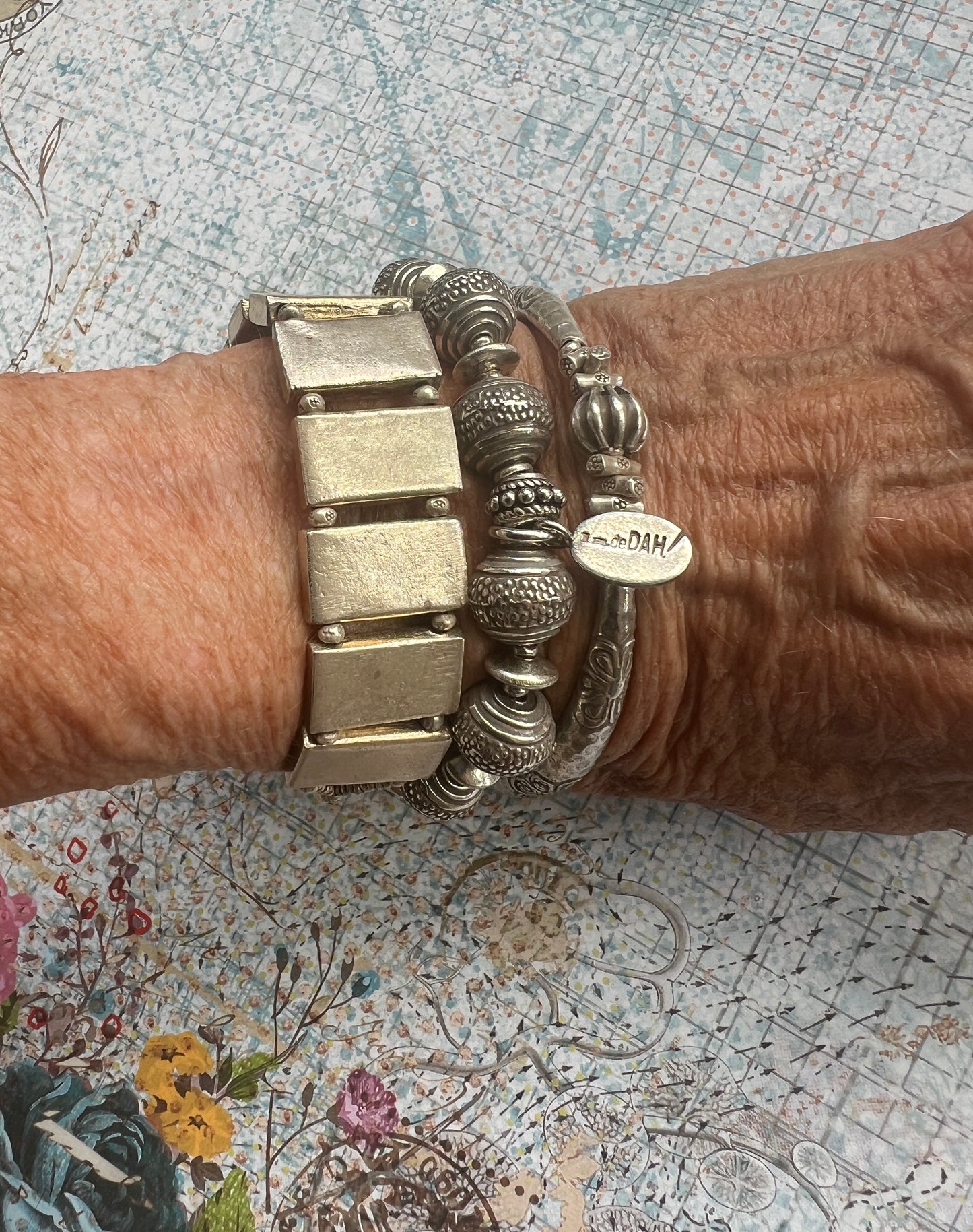 Fun, textured fine silver rounds stretch bracelet. Small (6”)