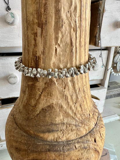 Stamped fine silver twigs bracelet with sterling clasp. 7.25-7.75”