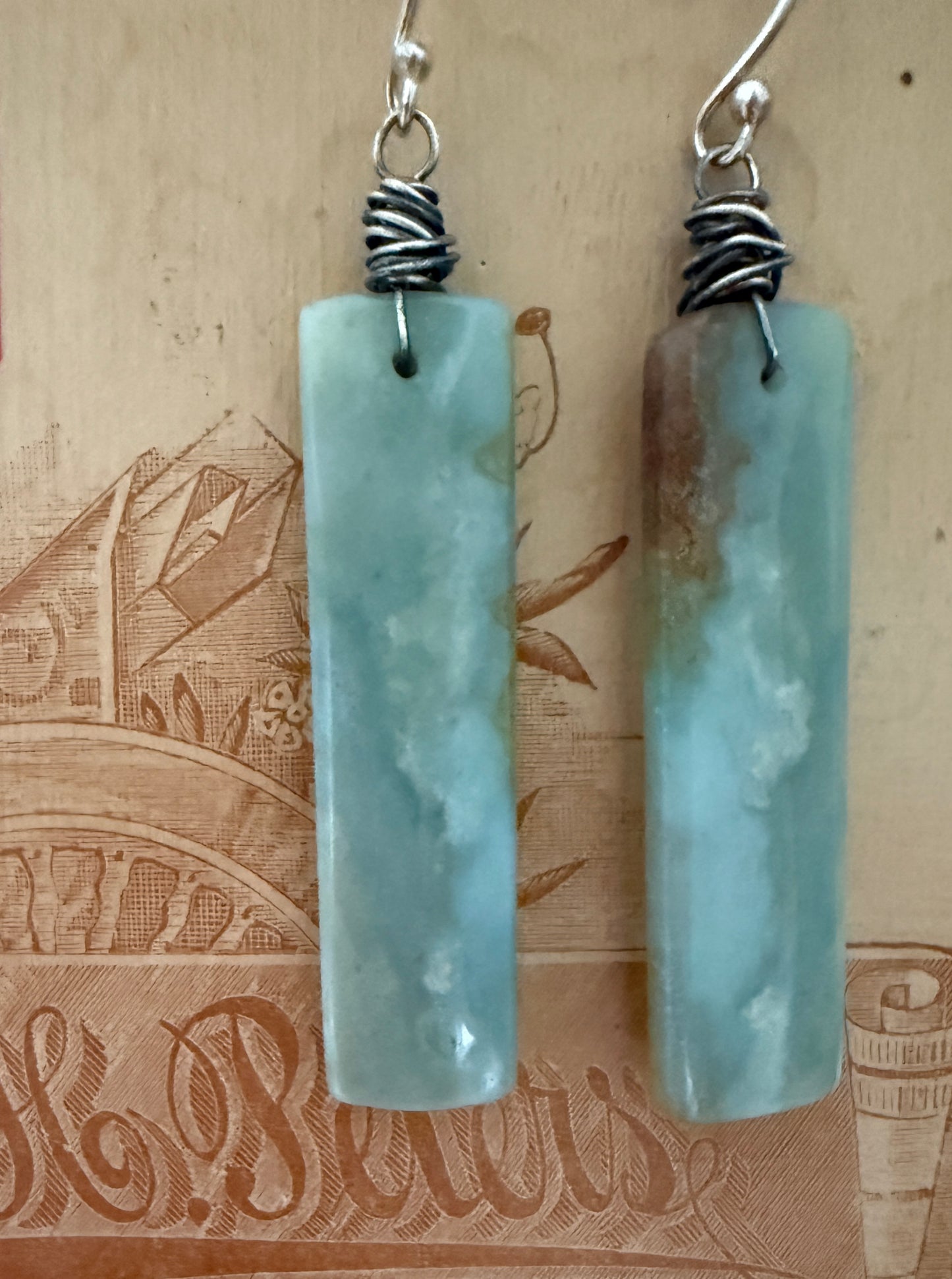 Green mountain jade tornado wrap earrings.