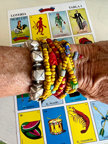 Maize glass bead stack of 7 bracelets.