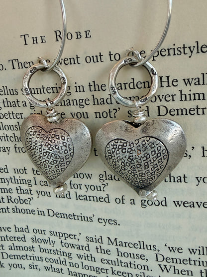 Textured fine silver heart earrings.