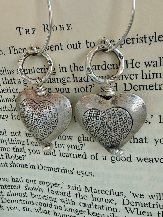 Textured fine silver heart earrings.