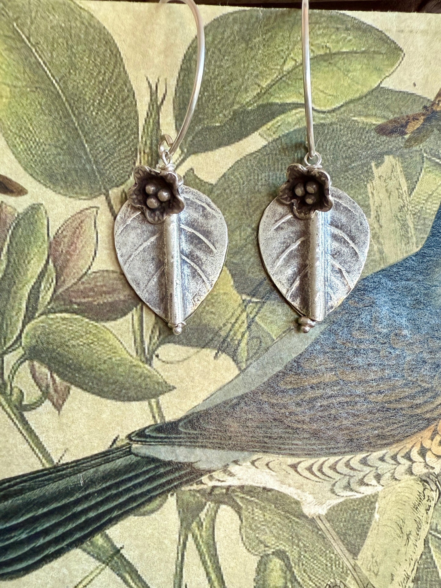 Fine silver leaf and flower earring on fine silver earwires.