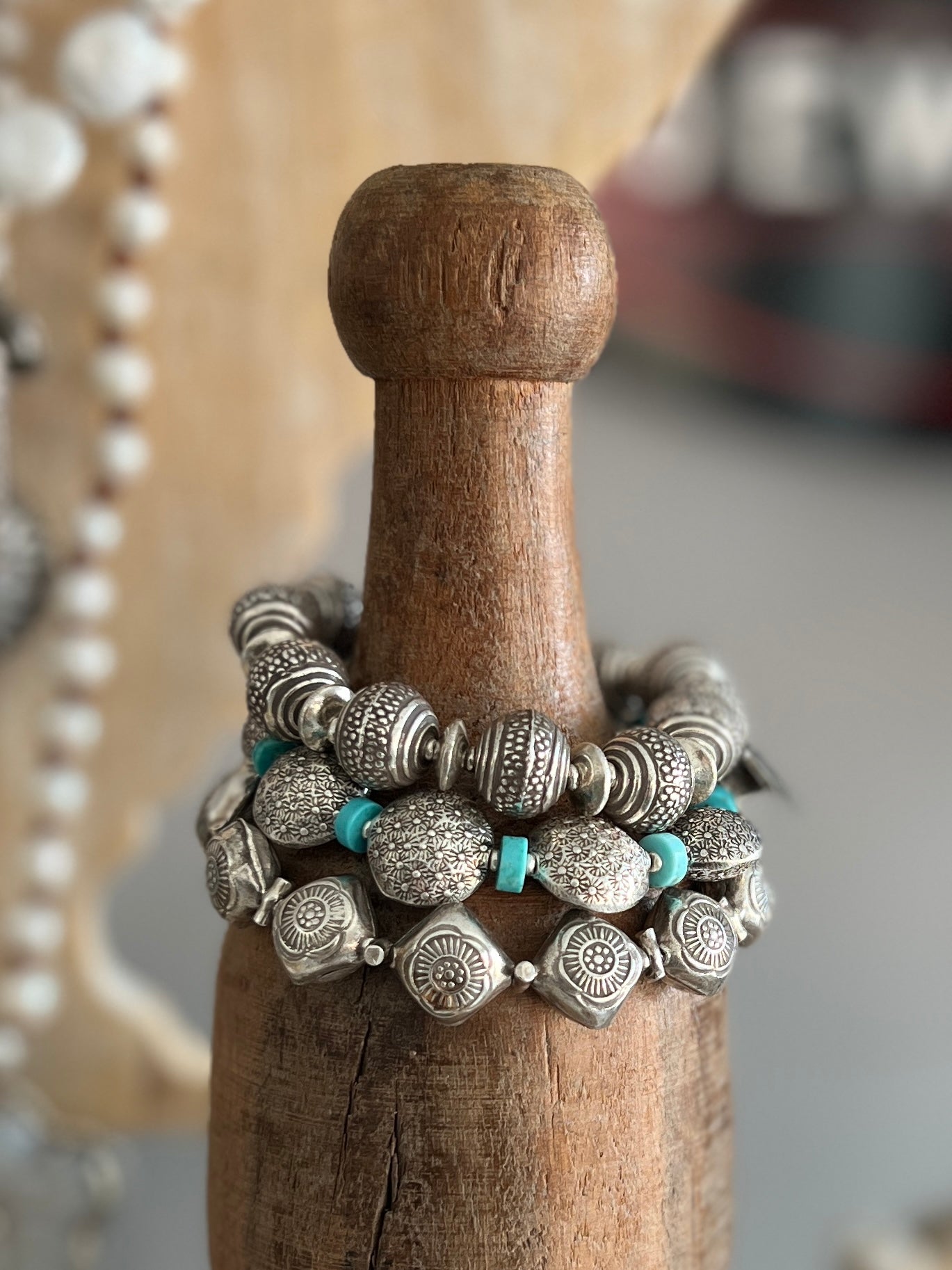 Stamped fine silver coins and turquoise bracelet. Adjustable 7-8”.