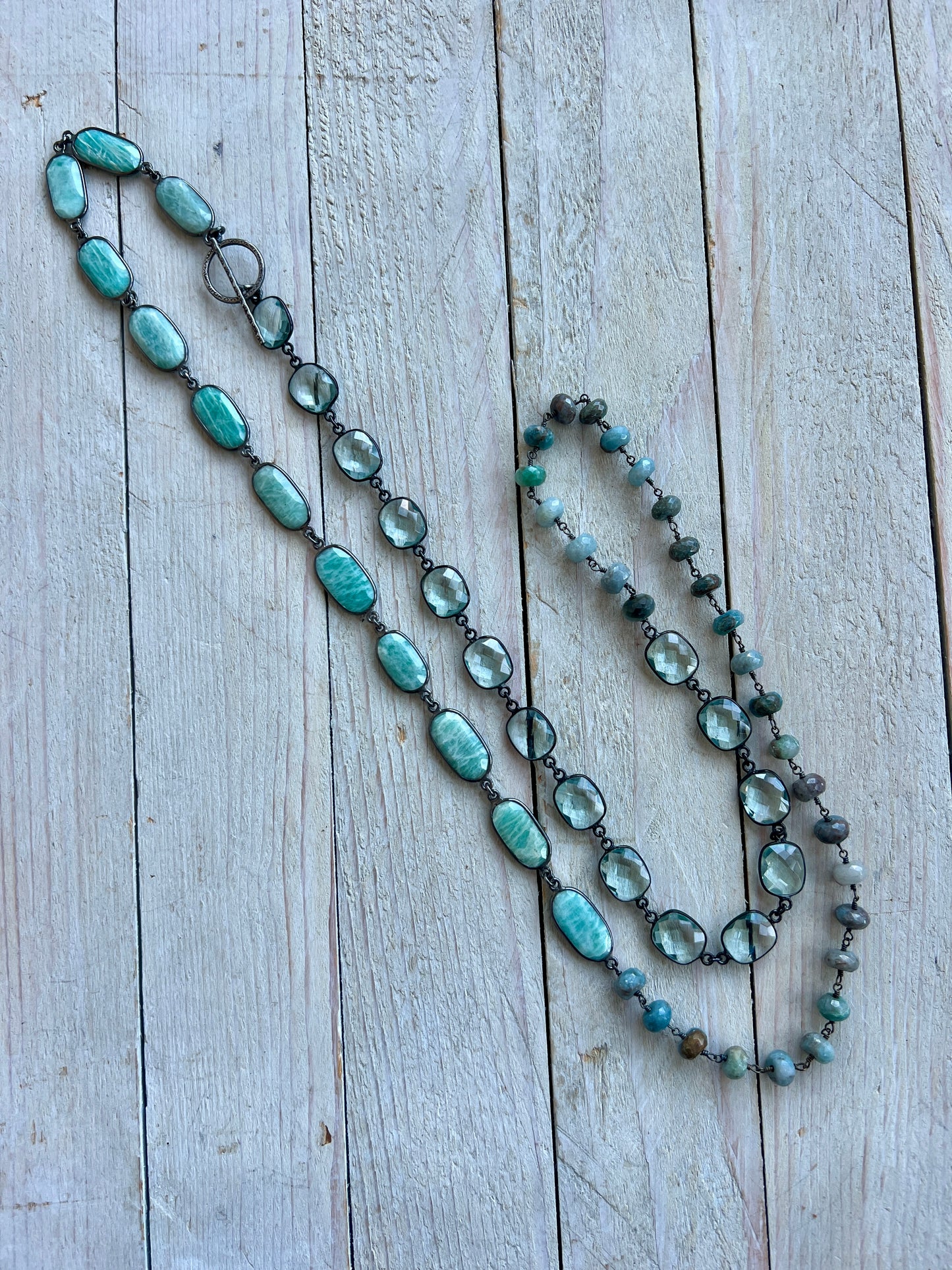 Beautiful aqua mix of green silverite, aqua crystal quartz, and Amazonite stones long necklace. 38”